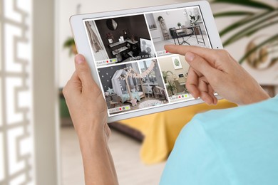 Image of Woman using smart home security system on tablet computer indoors, closeup. Device showing different rooms through cameras