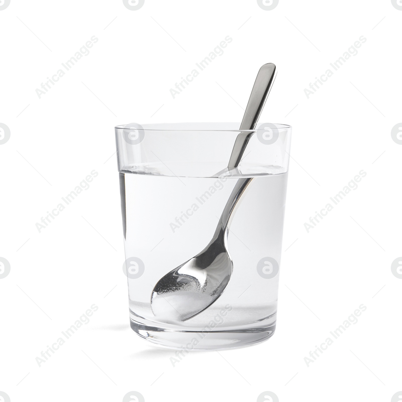 Photo of Glass of water with baking soda on light background. Space for text