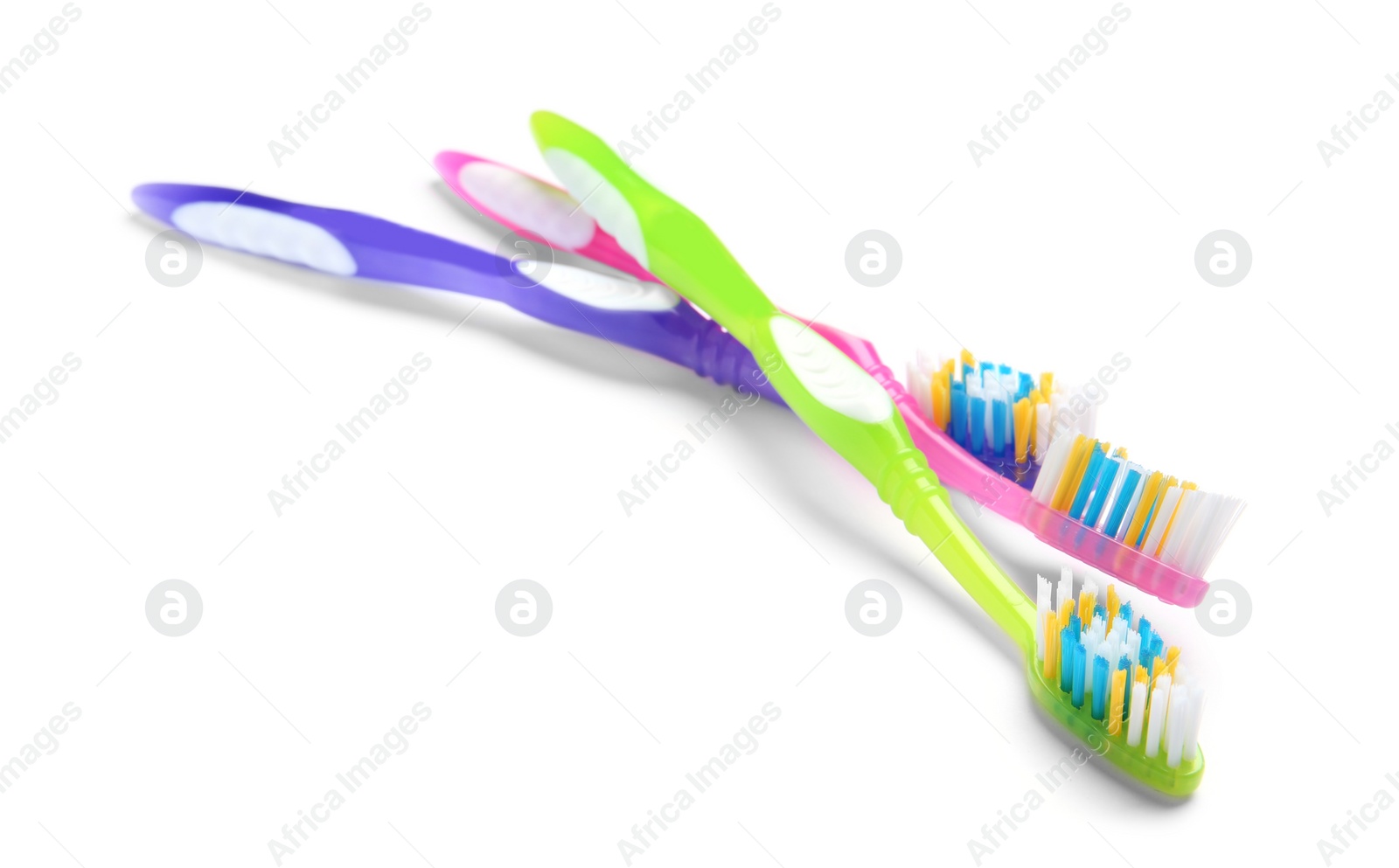 Photo of Color toothbrushes on white background. Dental care