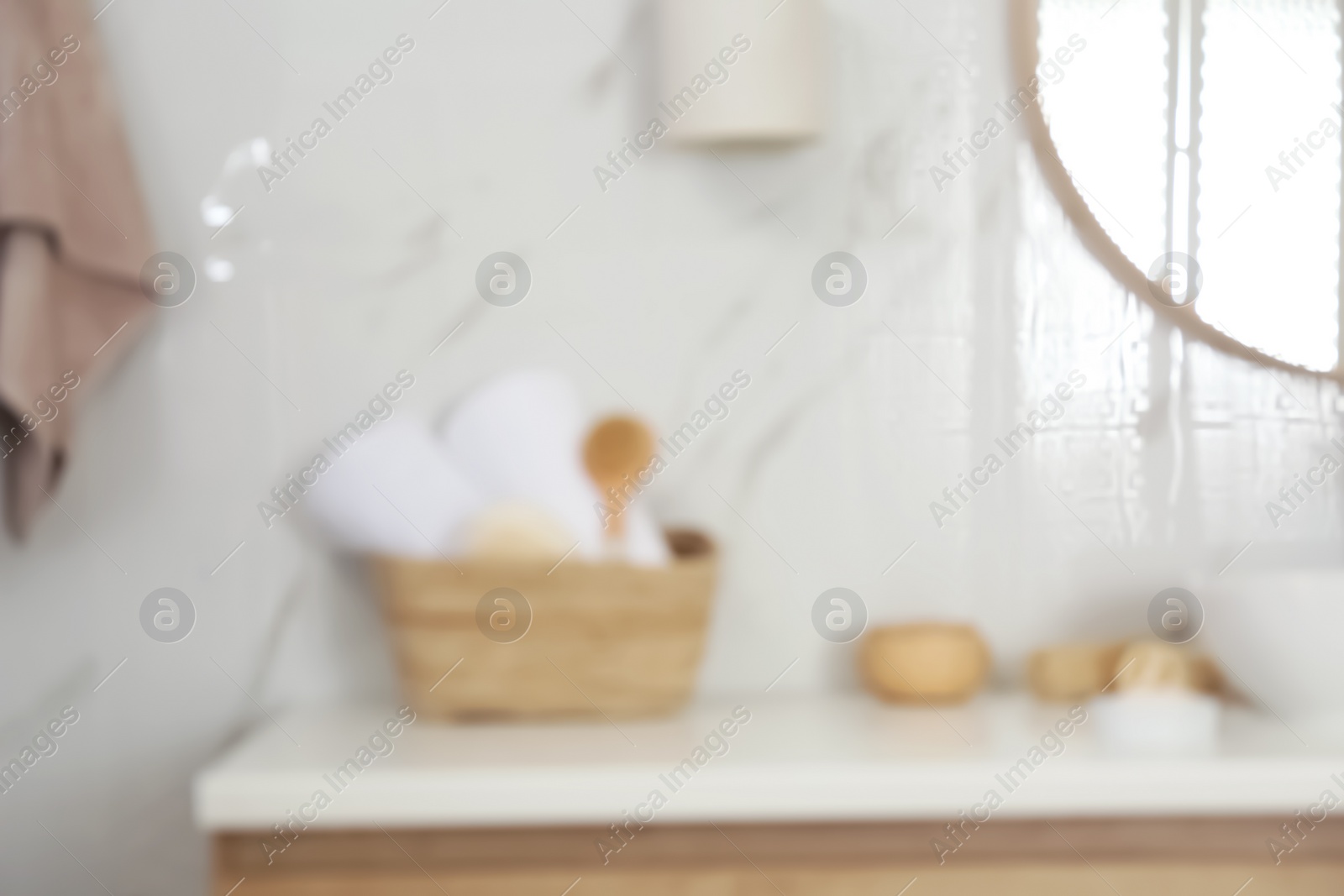 Photo of Blurred view of stylish modern bathroom with mirror