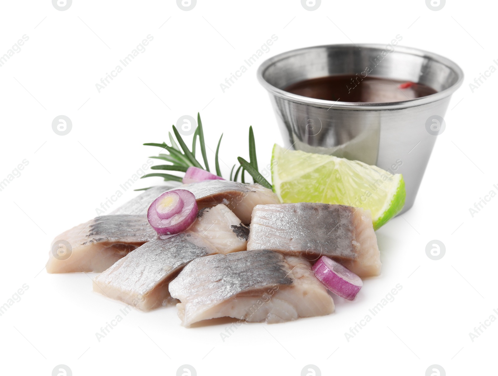 Photo of Pieces of tasty fish, onion and marinade isolated on white