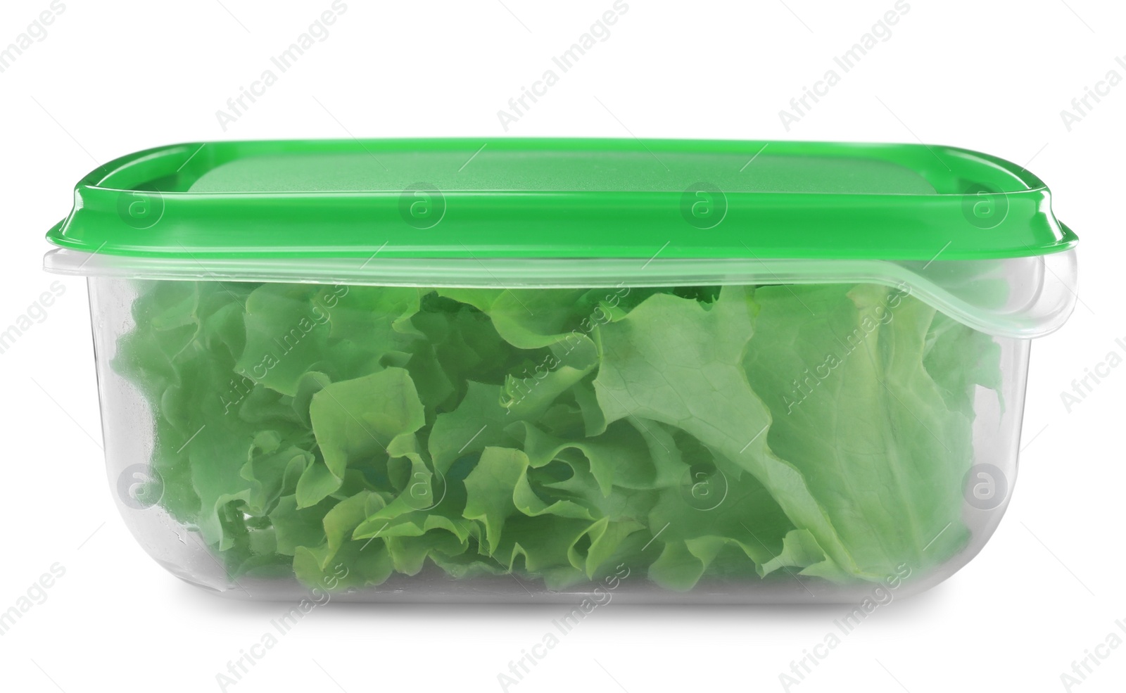 Photo of Fresh lettuce in plastic container isolated on white