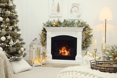 Fireplace in beautiful living room decorated for Christmas