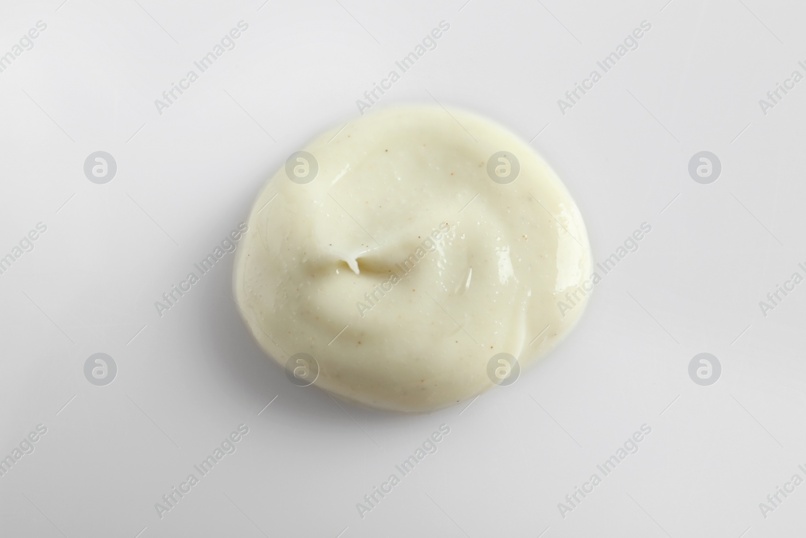 Photo of Sample of scrub isolated on white, top view