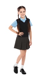 Full length portrait of cute girl in school uniform on white background