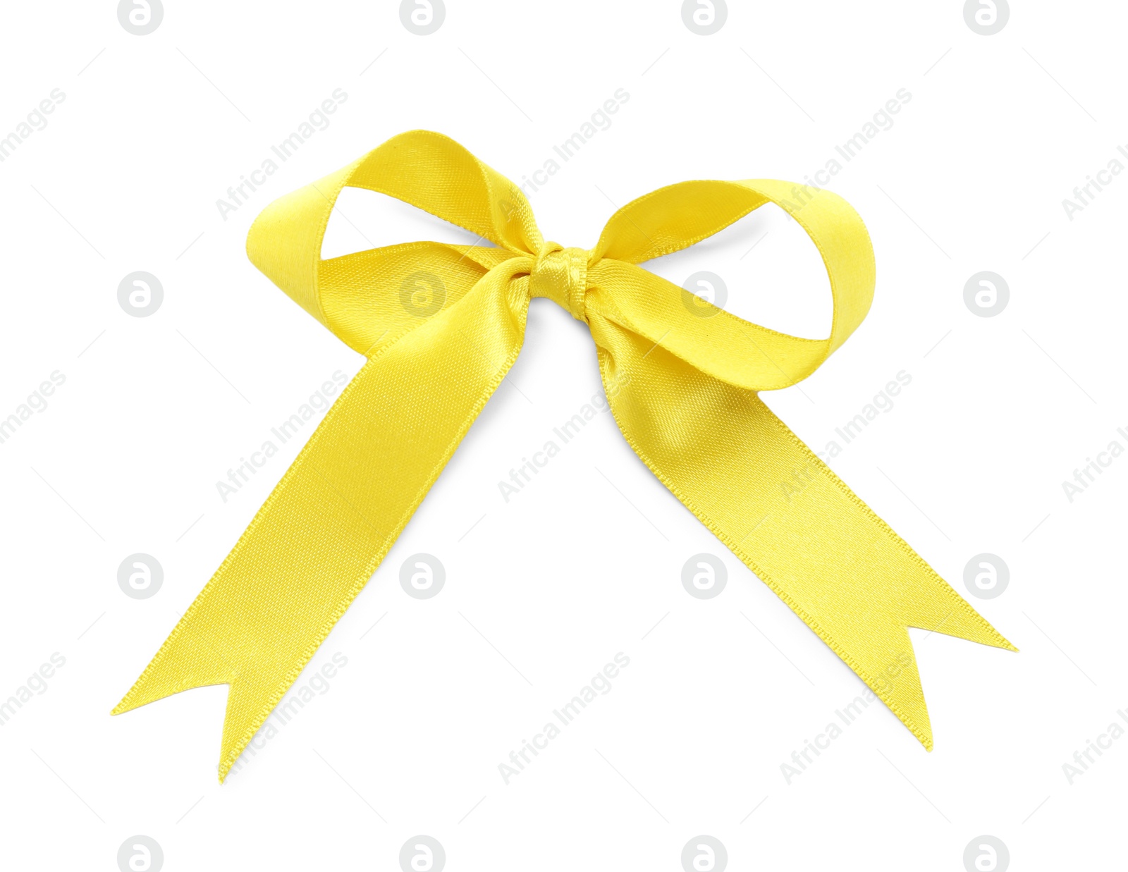 Photo of Beautiful yellow ribbon tied in bow isolated on white, top view