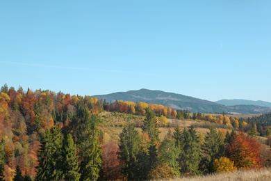 Picturesque landscape with blue sky over mountains