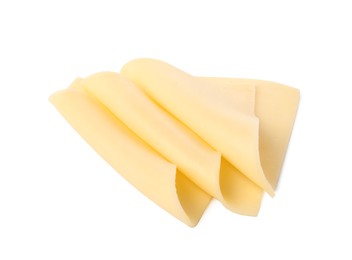 Photo of Slices of tasty fresh cheese isolated on white, top view