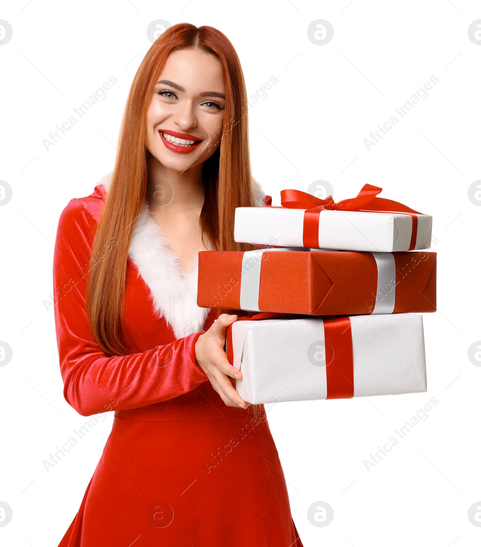 Photo of Young woman in red dress with Christmas gifts on white background