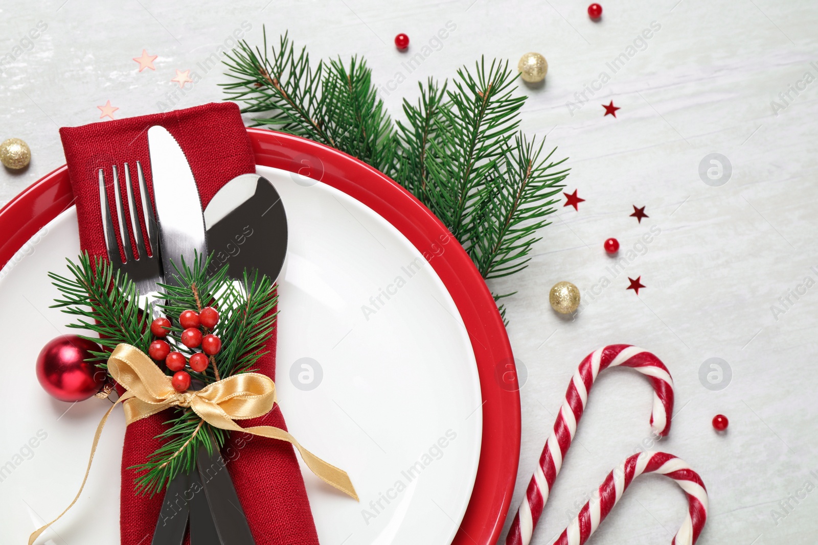 Photo of Christmas table setting on white background, flat lay