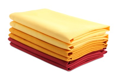 Photo of Stack of fabric napkins for table setting isolated on white