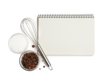 Photo of Blank recipe book, spices and whisk on white background, top view. Space for text