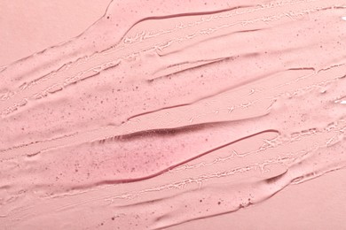 Cosmetic gel on pink background, top view