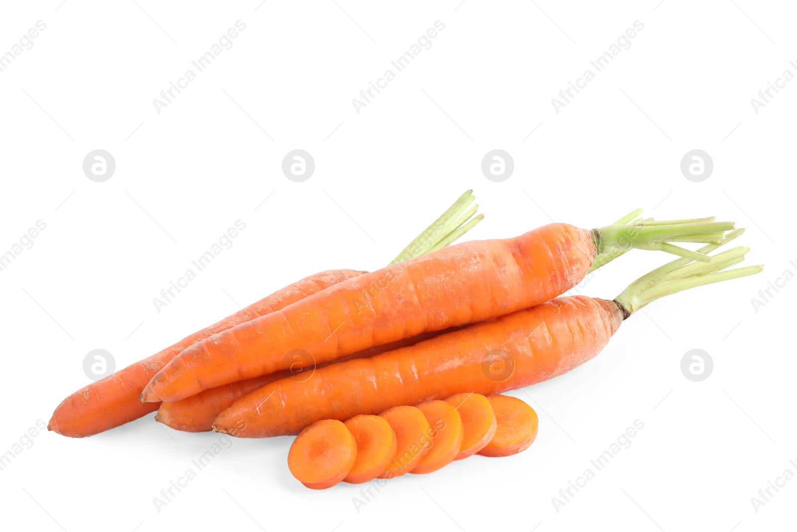 Whole and sliced ripe carrots isolated on white Photo of Whole and sliced ripe carrots isolated on white