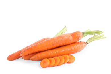 Photo of Whole and sliced ripe carrots isolated on white