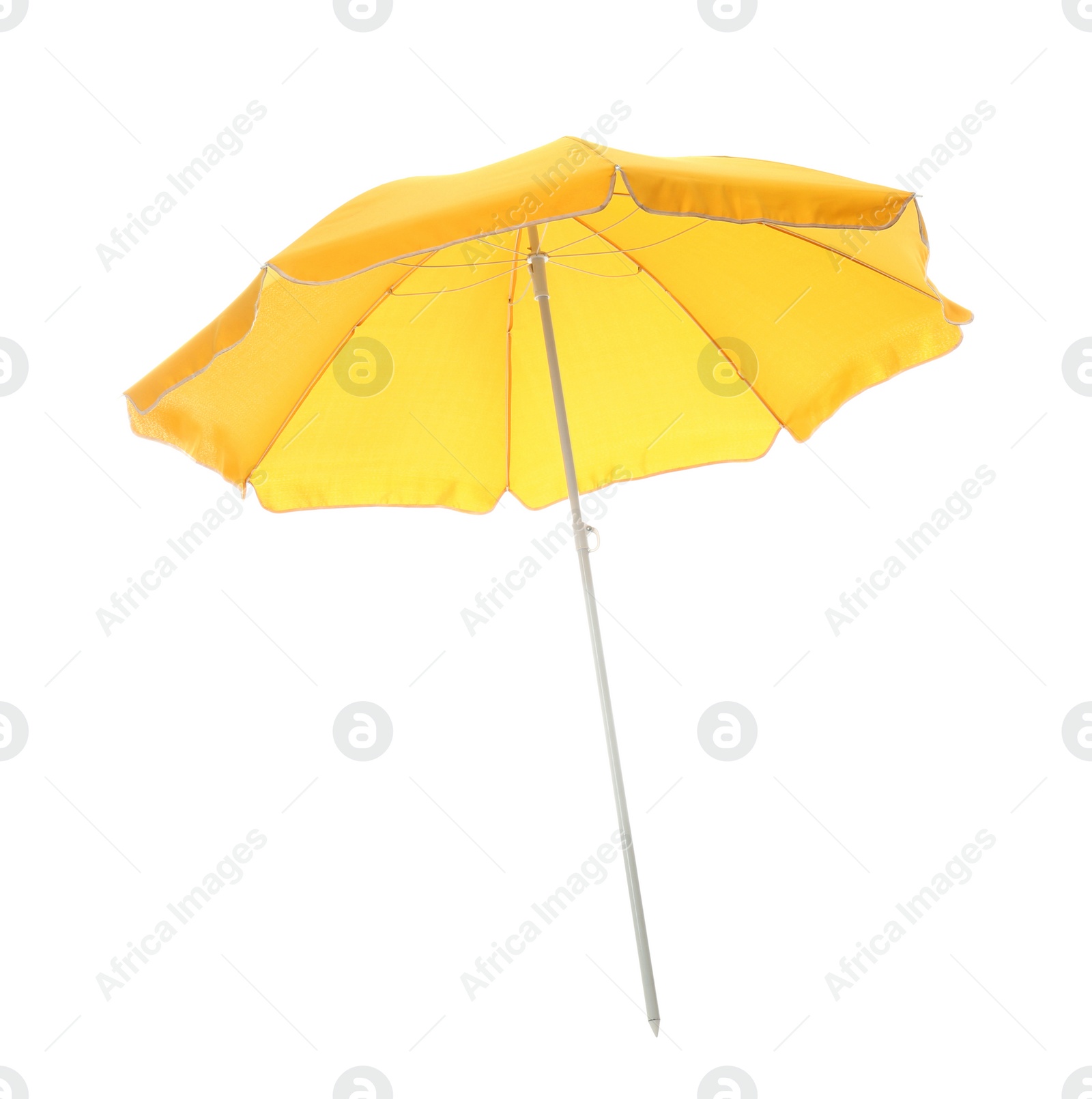 Photo of Open yellow beach umbrella isolated on white