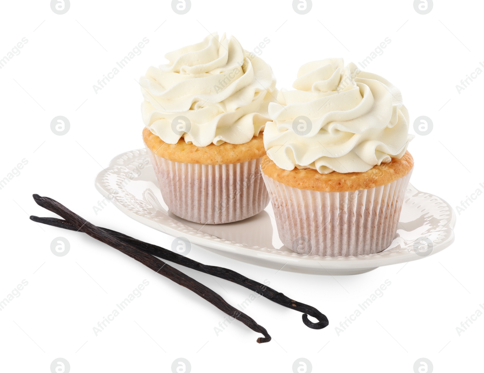 Photo of Tasty cupcakes with cream and vanilla pods isolated on white