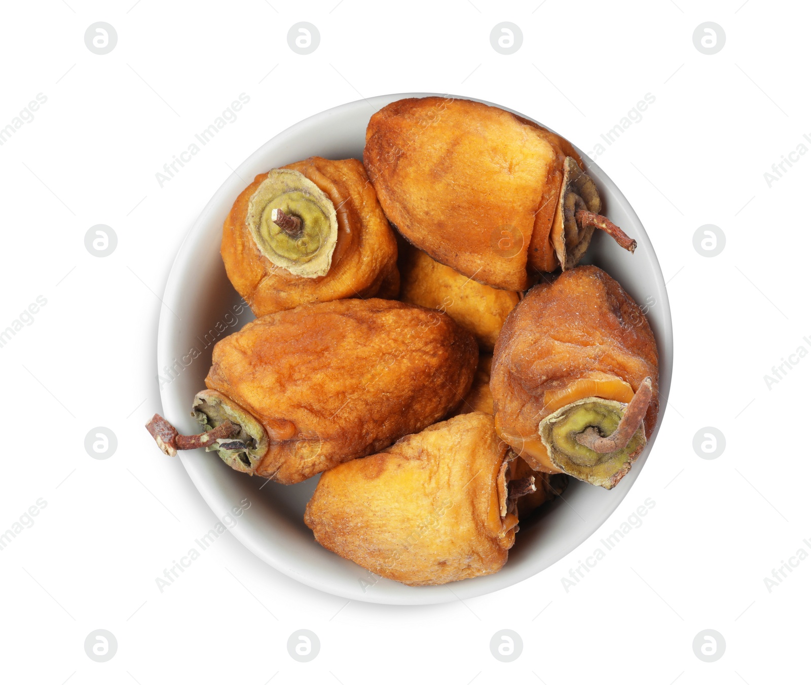 Photo of Tasty dried persimmon fruits in bowl on white background, top view