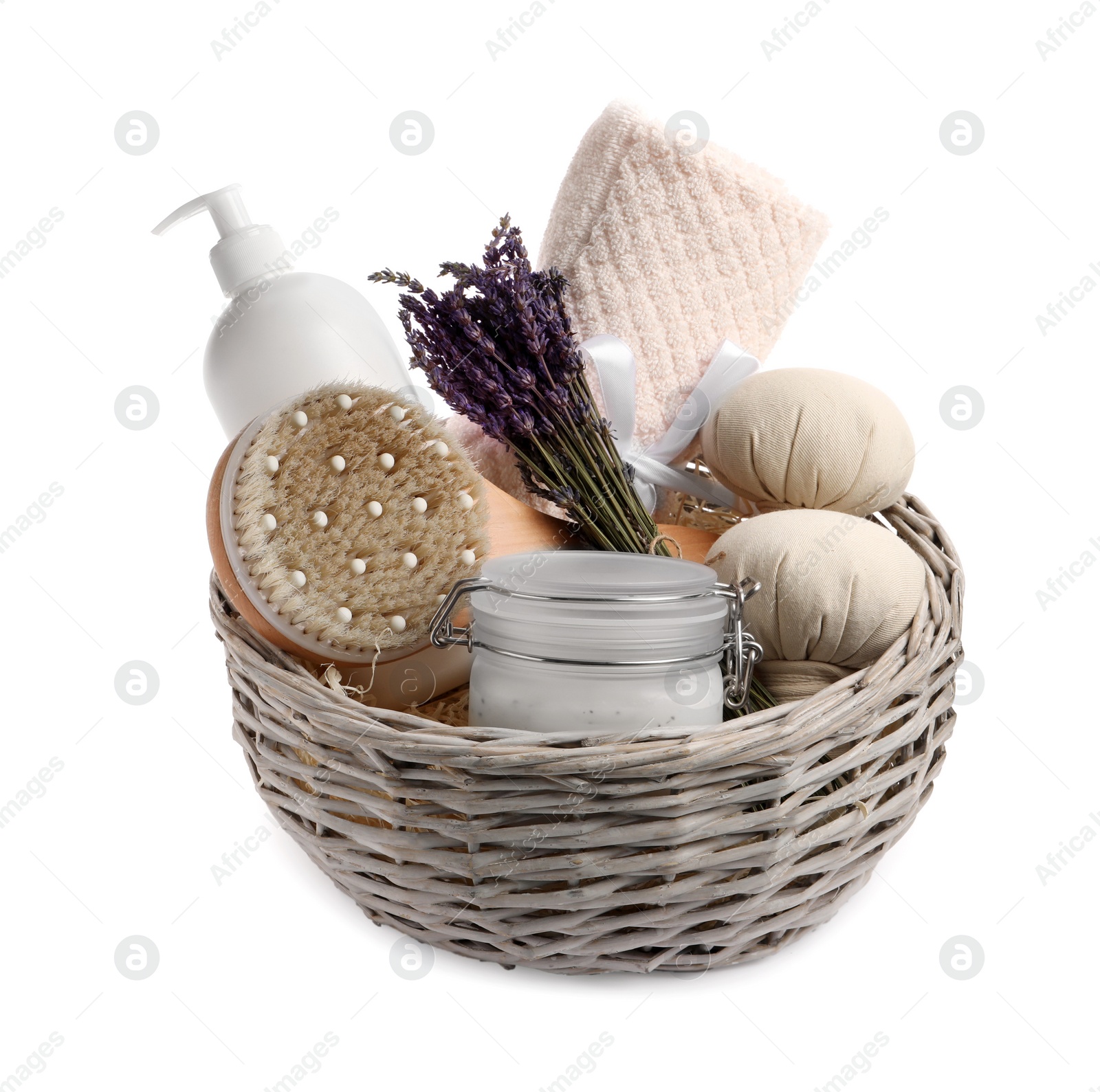 Photo of Spa gift set of different luxury products in wicker basket on white background