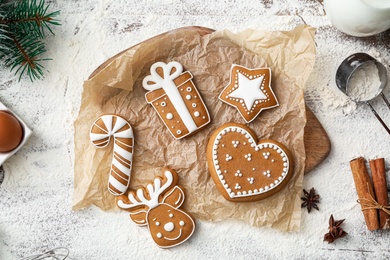 Photo of Flat lay composition with delicious homemade Christmas cookies on wooden table