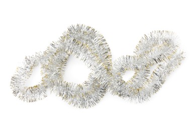 Photo of Shiny tinsel isolated on white, top view
