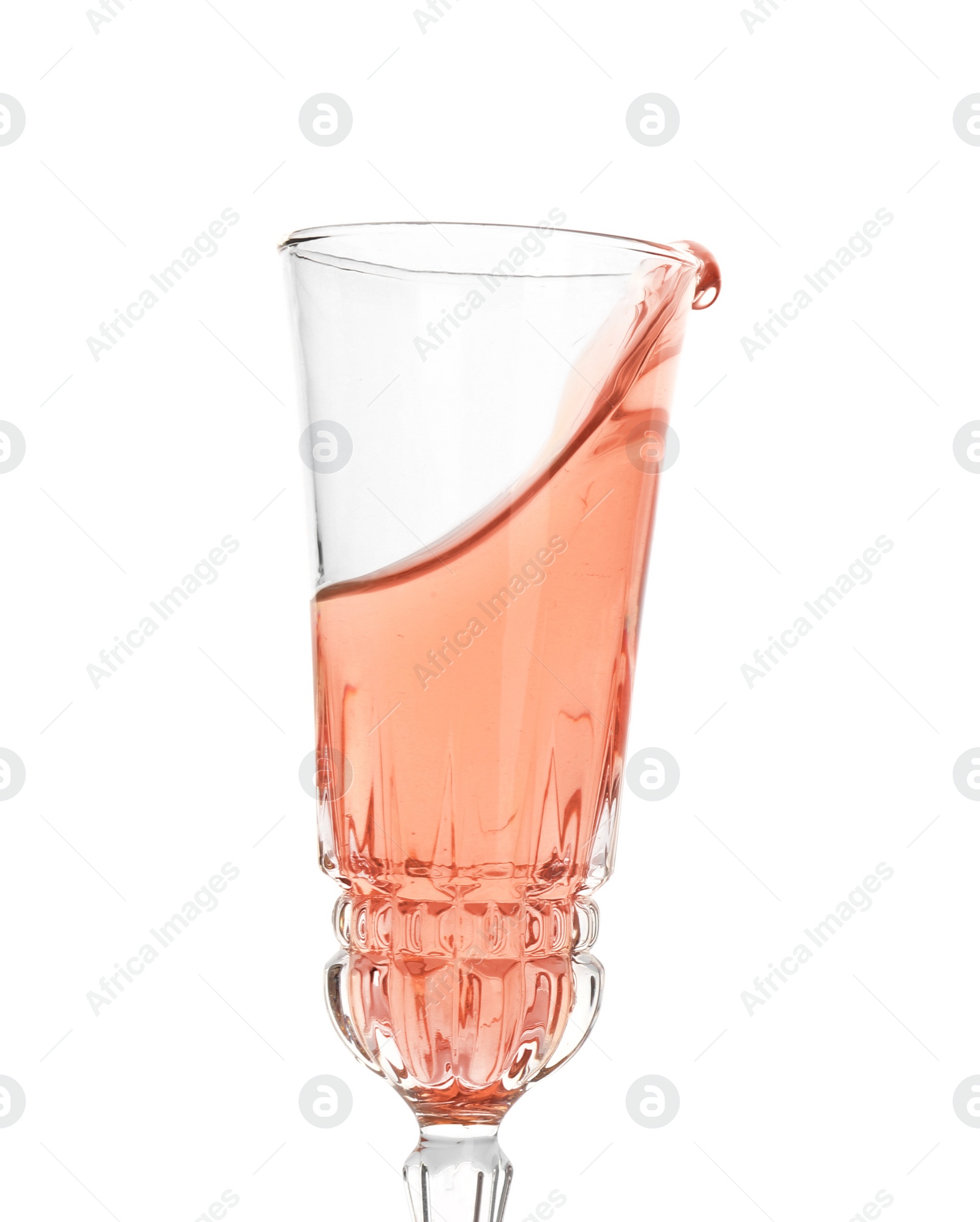 Photo of Glass of rose champagne on white background