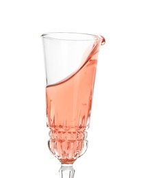 Photo of Glass of rose champagne on white background