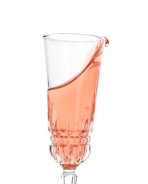 Glass of rose champagne on white background