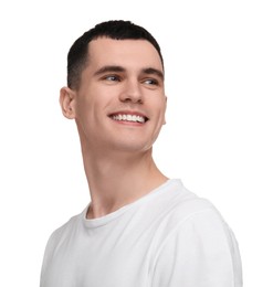 Handsome young man with clean teeth smiling on white background