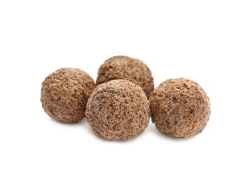 Delicious sweet chocolate truffles on white background