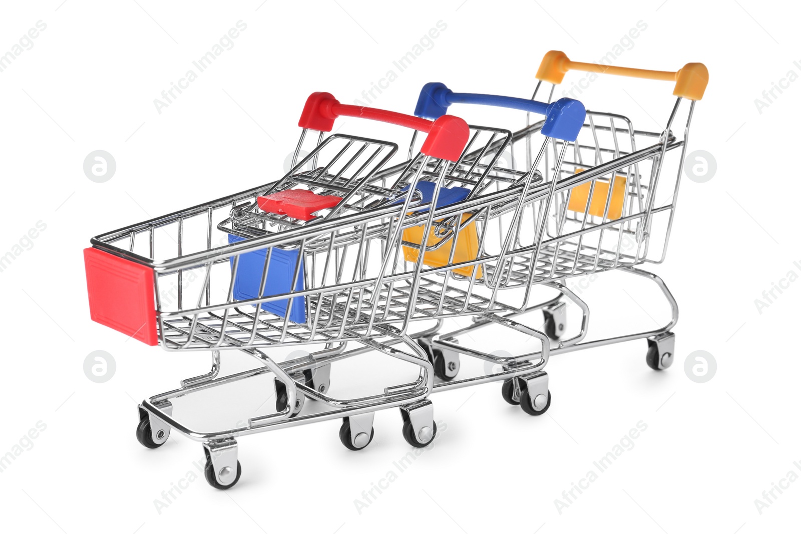 Photo of Empty metal shopping trolleys isolated on white