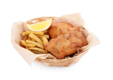 Photo of Tasty fish, chips and lemon in wicker bowl isolated on white