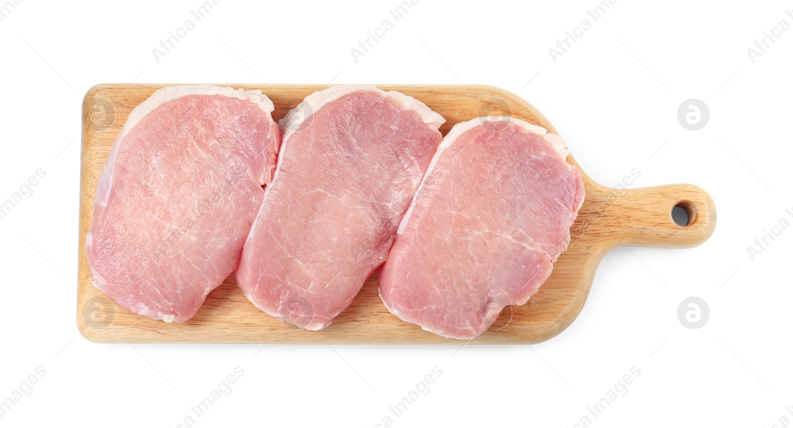Photo of Wooden board with pieces of raw pork meat isolated on white, top view
