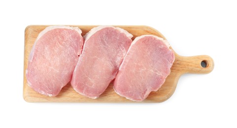 Photo of Wooden board with pieces of raw pork meat isolated on white, top view