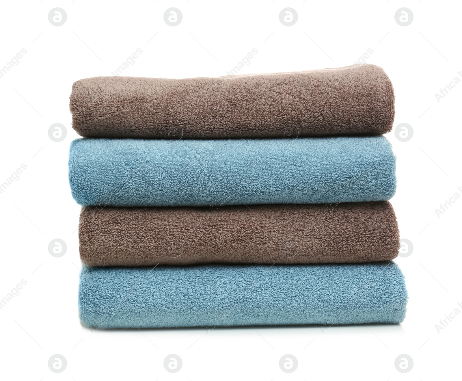 Photo of Stack of clean folded towels on white background