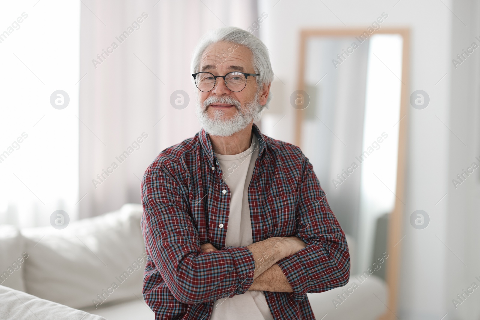 Photo of Portrait of happy grandpa with glasses indoors