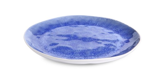 Photo of One blue ceramic plate isolated on white