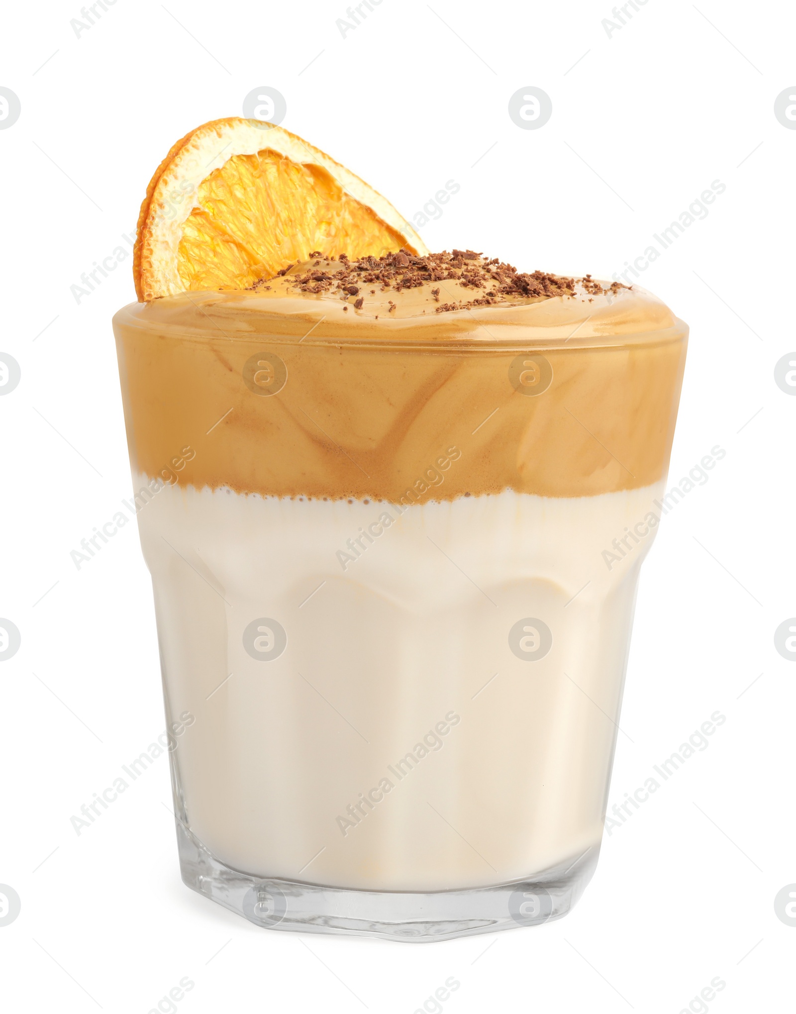 Photo of Glass of delicious dalgona coffee with dry orange and chocolate isolated on white