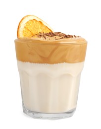 Glass of delicious dalgona coffee with dry orange and chocolate isolated on white