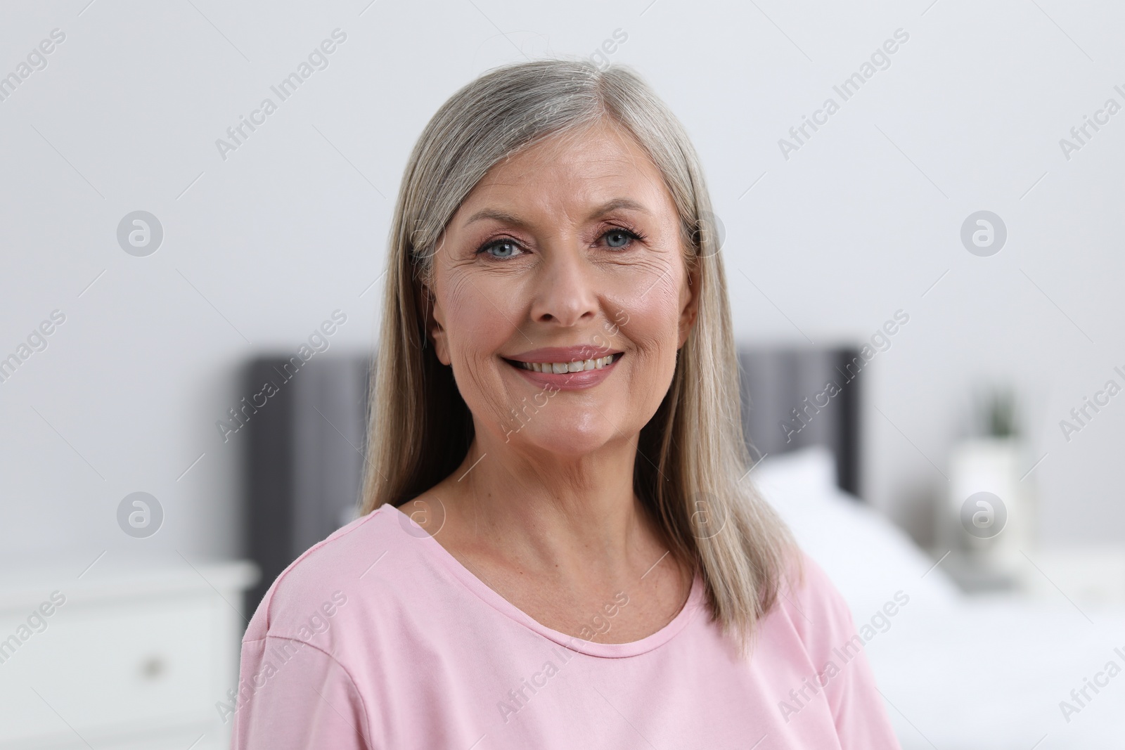 Photo of Portrait of beautiful senior woman at home