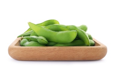 Photo of Wooden plate with green edamame pods on white background