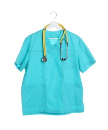 Photo of Turquoise medical uniform and stethoscope isolated on white