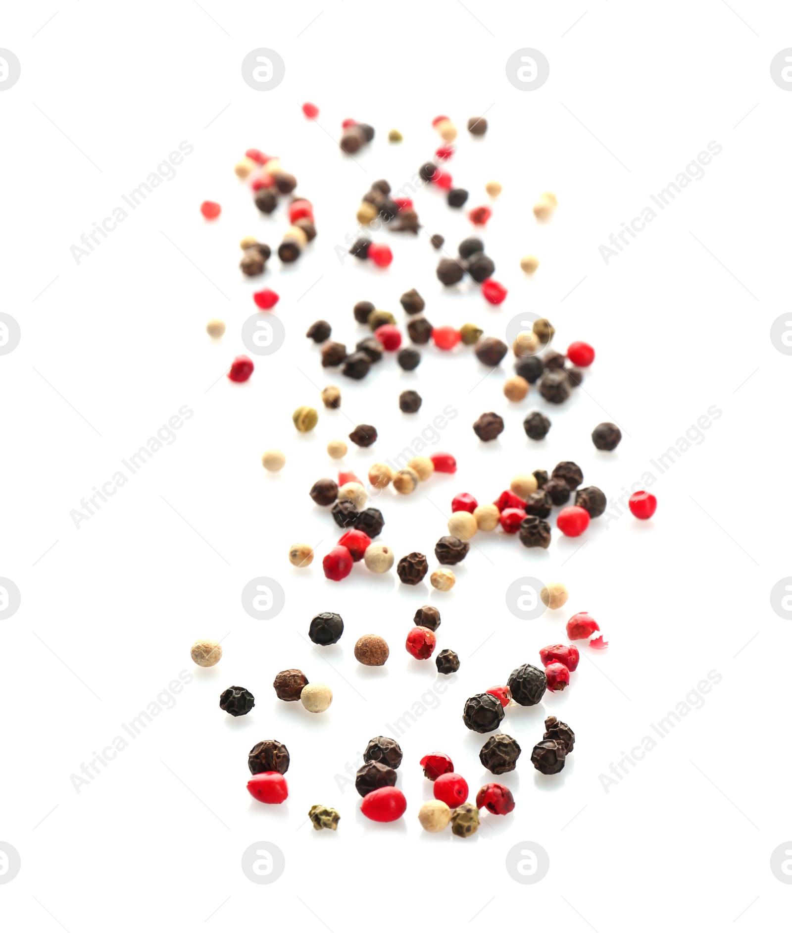 Photo of Mix of different pepper grains on white background, top view