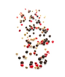 Photo of Mix of different pepper grains on white background, top view