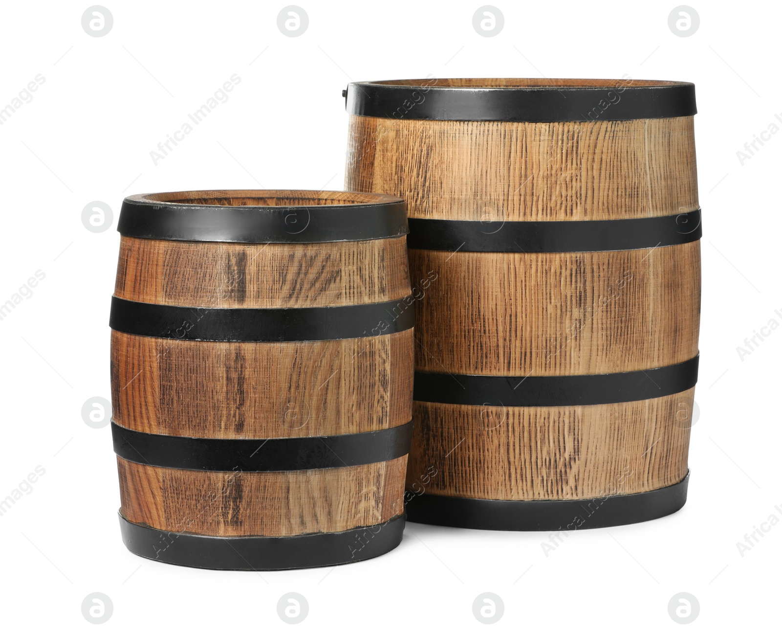 Photo of Two traditional wooden barrels isolated on white