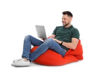 Photo of Happy man with laptop on white background