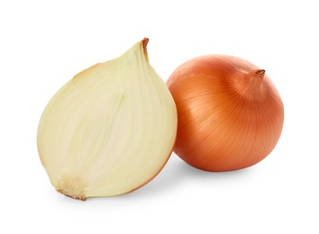 Whole and cut onions on white background