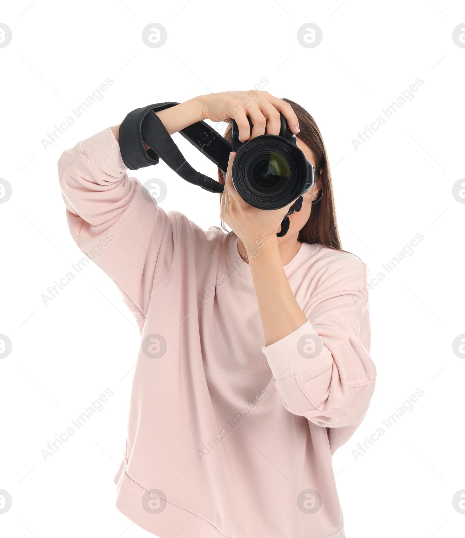 Photo of Professional photographer taking picture on white background