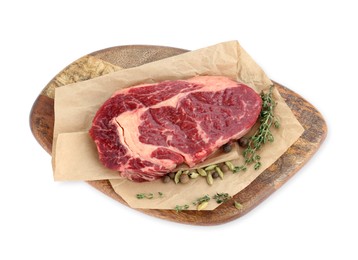 Photo of Piece of fresh beef meat, thyme and spices on white background, top view