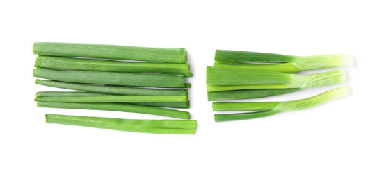 Cut green spring onion isolated on white, top view